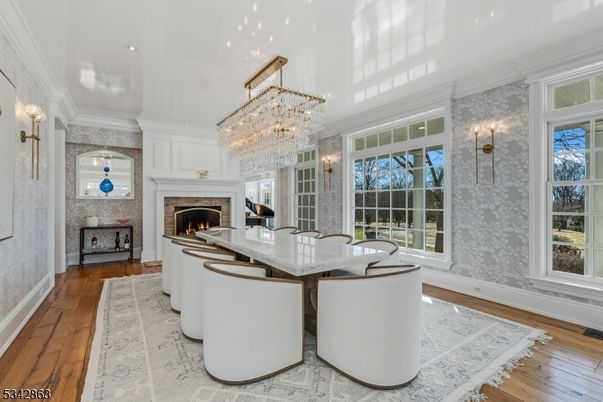Chandelier, Dining room, Fireplace, Interior, Living room, Recessed Lighting, Wood Texture Flooring