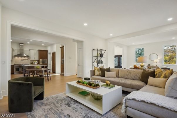 Dining room, Interior, Kitchen, Living room, Recessed Lighting, Stainless Steel Appliances, Wood Texture Flooring