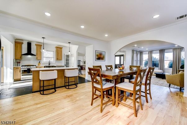 Dining room, Interior, Kitchen, Living room, Pendant Lights, Recessed Lighting, Stainless Steel Appliances, Wood Texture Flooring
