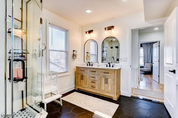 Bathroom, Dual Sink Vanities, Glass Shower, Interior, Recessed Lighting, Wood Texture Flooring