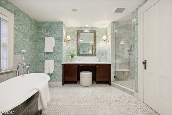 Bathroom, Dual Sink Vanities, Free Standing Baths, Glass Shower, Interior, Marble Walls, Recessed Lighting