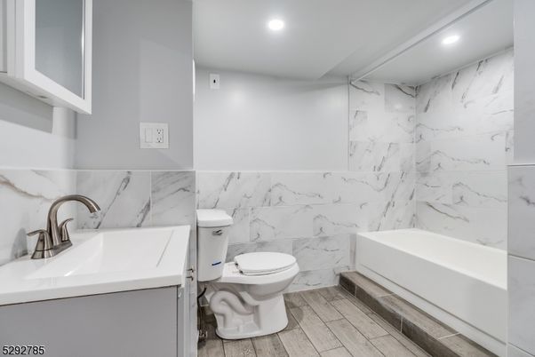 Bathroom, Interior, Marble Walls, Recessed Lighting, Wood Texture Flooring