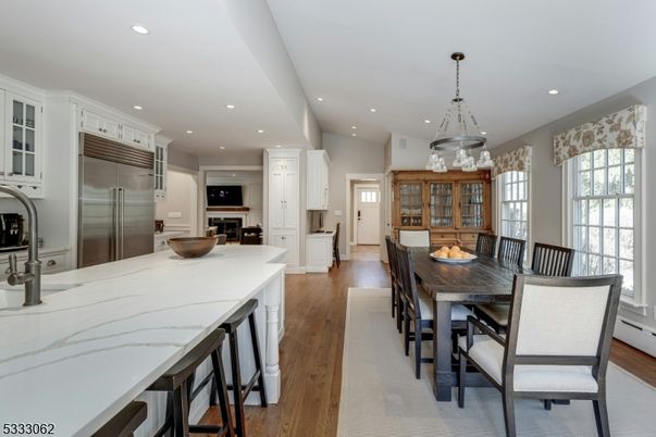 Dining room, Interior, Kitchen, Pendant Lights, Recessed Lighting, Stainless Steel Appliances, Wood Texture Flooring