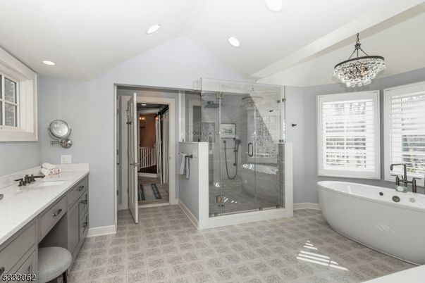 Bathroom, Chandelier, Dual Sink Vanities, Free Standing Baths, Glass Shower, Interior, Recessed Lighting