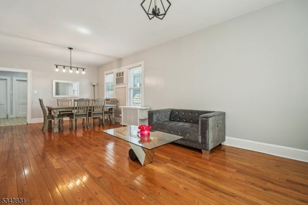 Dining room, Interior, Living room, Pendant Lights, Wood Texture Flooring