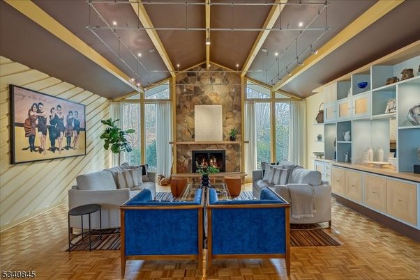 Fireplace, Interior, Living room, Recessed Lighting, Stone Walls, Wood Texture Flooring
