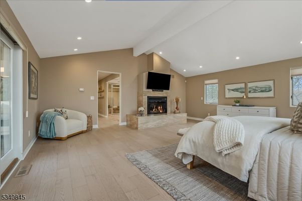 Bedroom, Fireplace, Interior, Recessed Lighting, Wood Texture Flooring