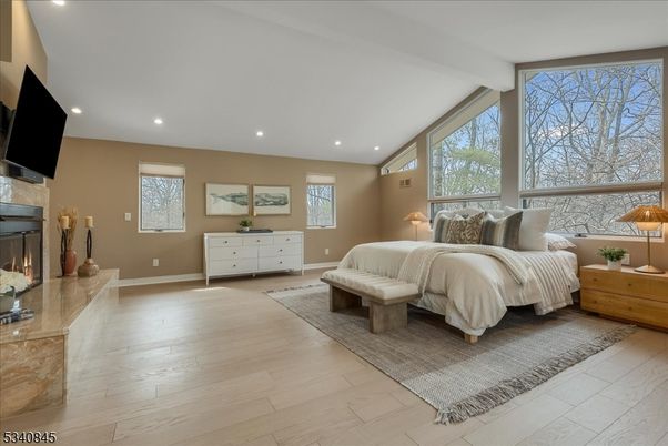 Bedroom, Fireplace, Interior, Recessed Lighting, Wood Texture Flooring