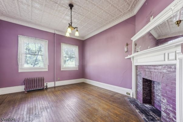 Empty room, Fireplace, Interior, Pendant Lights, Wood Texture Flooring