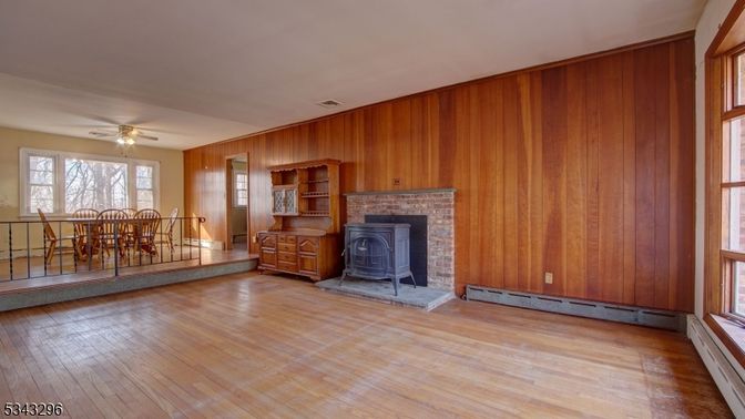 Dining room, Empty room, Fireplace, Interior, Wood Texture Flooring, Wooden Walls