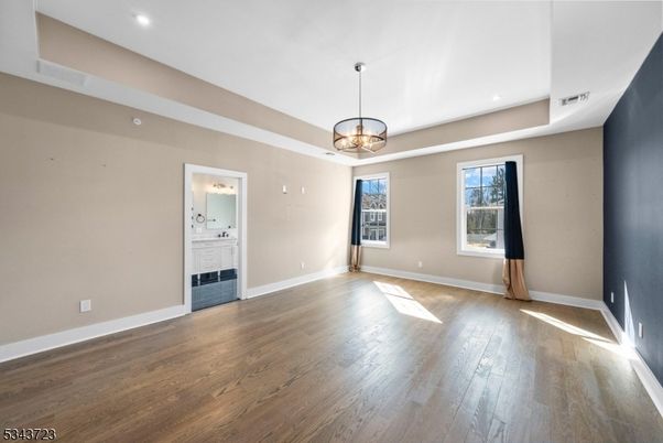 Chandelier, Empty room, Fireplace, Interior, Recessed Lighting, Wood Texture Flooring