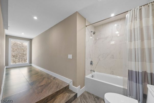 Bathroom, Interior, Marble Walls, Recessed Lighting, Wood Texture Flooring