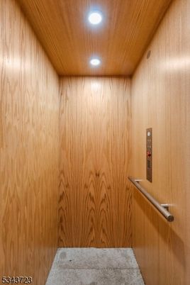 Elevator, Interior, Recessed Lighting, Wooden Ceilings, Wooden Walls