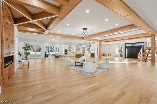 Dining room, Fireplace, Interior, Living room, Pendant Lights, Recessed Lighting, Wooden Beams, Wood Texture Flooring