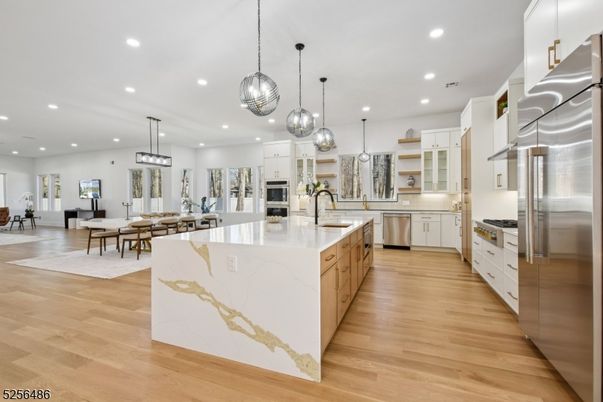 Dining room, Interior, Kitchen, Pendant Lights, Recessed Lighting, Stainless Steel Appliances, Wood Texture Flooring
