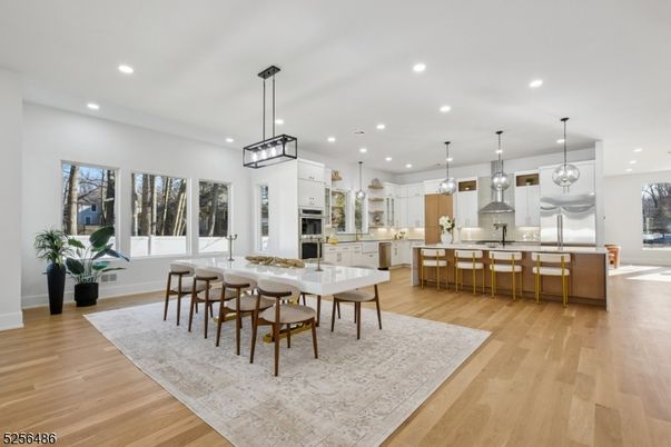 Dining room, Interior, Kitchen, Pendant Lights, Recessed Lighting, Stainless Steel Appliances, Wood Texture Flooring