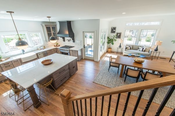 Dining room, Interior, Kitchen, Living room, Pendant Lights, Recessed Lighting, Stainless Steel Appliances, Wood Texture Flooring