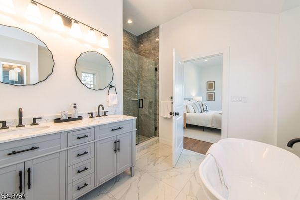 Bathroom, Bedroom, Dual Sink Vanities, Free Standing Baths, Glass Shower, Interior, Marble, Recessed Lighting