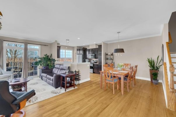 Dining room, Interior, Kitchen, Living room, Pendant Lights, Recessed Lighting, Stainless Steel Appliances, Wood Texture Flooring