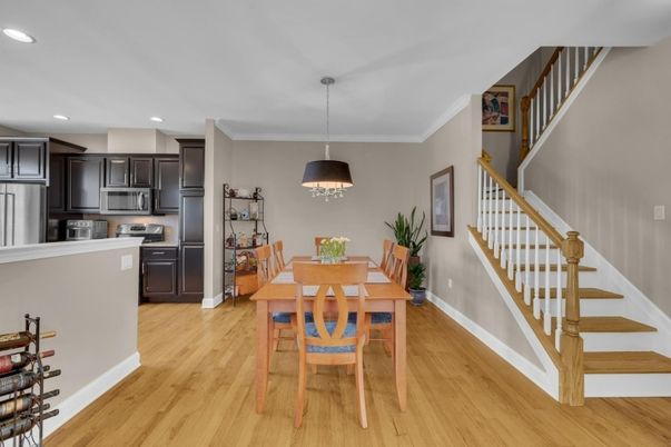 Dining room, Interior, Kitchen, Pendant Lights, Recessed Lighting, Stainless Steel Appliances, Wood Texture Flooring