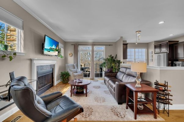 Dining room, Fireplace, Interior, Living room, Recessed Lighting, Wood Texture Flooring
