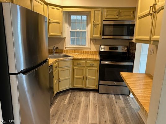 Interior, Kitchen, Stainless Steel Appliances, Wood Texture Flooring