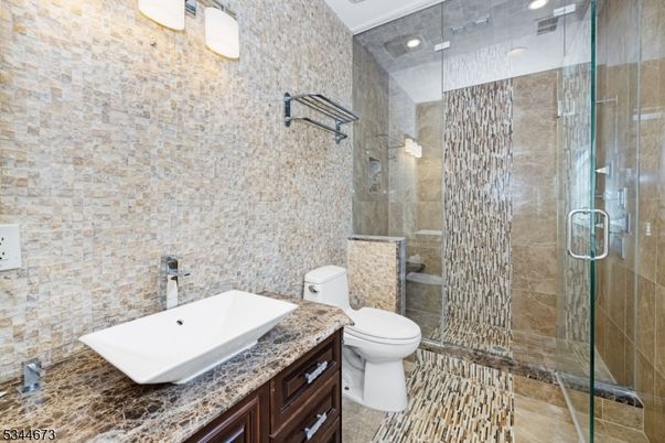 Bathroom, Glass Shower, Interior, Recessed Lighting, Stone Walls