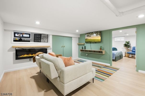 Fireplace, Interior, Living room, Recessed Lighting, Wood Texture Flooring