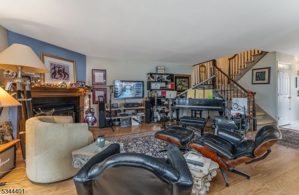 Fireplace, Interior, Living room, Piano, Wood Texture Flooring