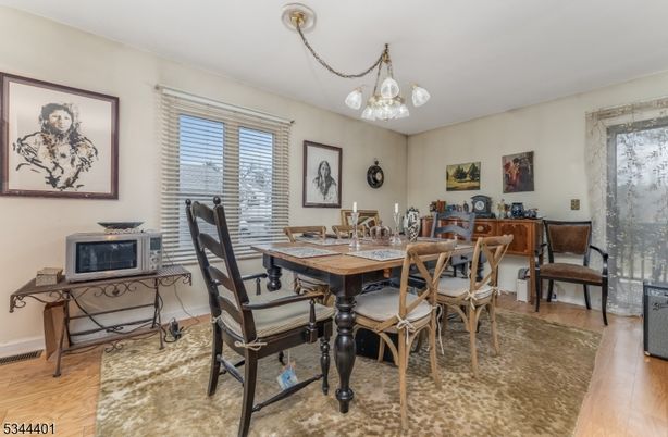 Chandelier, Dining room, Interior, Wood Texture Flooring