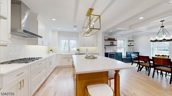 Chandelier, Dining room, Interior, Kitchen, Pendant Lights, Recessed Lighting, Stainless Steel Appliances, Wood Texture Flooring