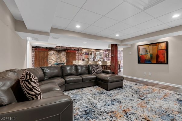 Interior, Living room, Recessed Lighting, Stone Walls, Wood Texture Flooring