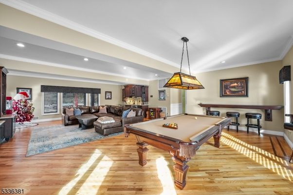 Billiard Table, Game Room, Interior, Living room, Pendant Lights, Recessed Lighting, Wood Texture Flooring