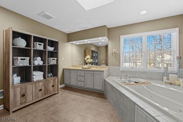 Bathroom, Dual Sink Vanities, Interior, Recessed Lighting, Tile Countertops