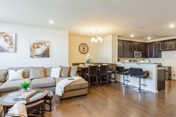 Chandelier, Dining room, Interior, Kitchen, Living room, Recessed Lighting, Wood Texture Flooring