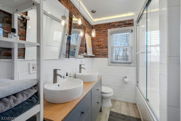 Bathroom, Glass Shower, Interior, Pendant Lights, Stone Walls, Wood Texture Flooring