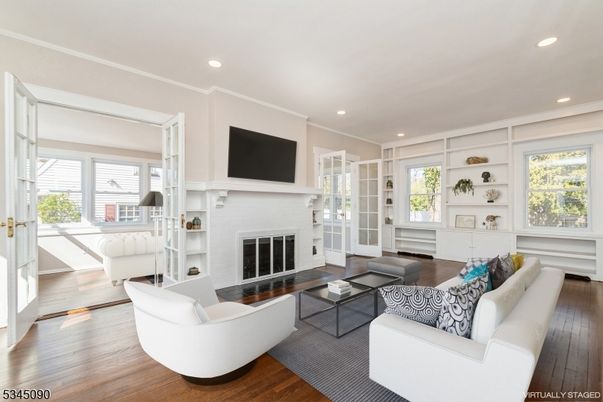 Fireplace, Interior, Living room, Recessed Lighting, Wood Texture Flooring