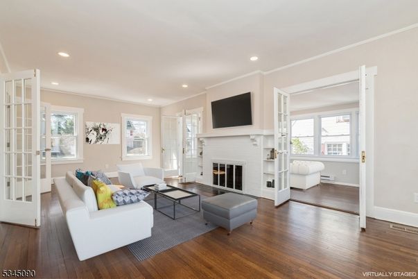 Fireplace, Interior, Living room, Recessed Lighting, Wood Texture Flooring