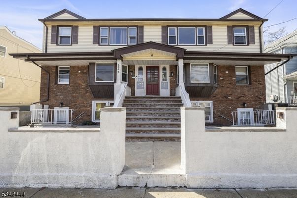 Exterior, Facade, Brick Facade, American Foursquare