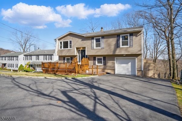 Attached, Exterior, Facade, Raised Ranch