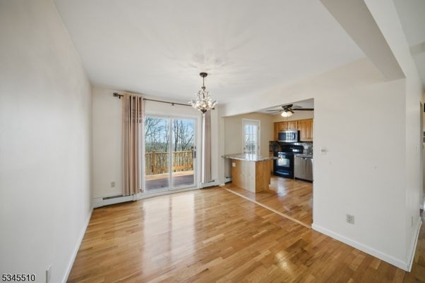 Chandelier, Empty room, Interior, Kitchen, Stainless Steel Appliances, Wood Texture Flooring