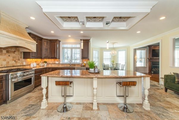 Chandelier, Dining room, Interior, Kitchen, Pendant Lights, Recessed Lighting, Stainless Steel Appliances