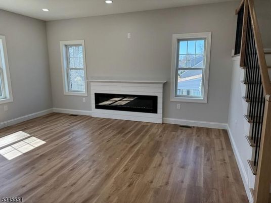 Empty room, Fireplace, Interior, Recessed Lighting, Wood Texture Flooring