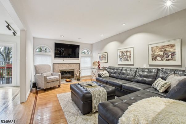 Fireplace, Interior, Living room, Recessed Lighting, Wood Texture Flooring
