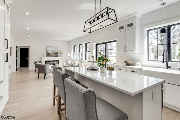 Dining room, Fireplace, Interior, Kitchen, Living room, Pendant Lights, Recessed Lighting, Wood Texture Flooring