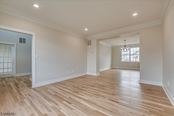 Chandelier, Empty room, Interior, Recessed Lighting, Wood Texture Flooring