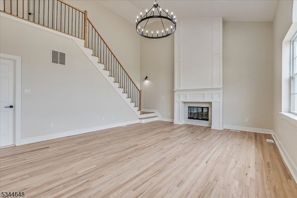 Chandelier, Empty room, Fireplace, Interior, Wood Texture Flooring