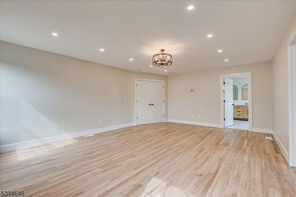 Chandelier, Empty room, Interior, Recessed Lighting, Wood Texture Flooring