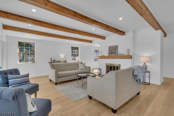 Fireplace, Interior, Living room, Recessed Lighting, Wooden Beams, Wood Texture Flooring