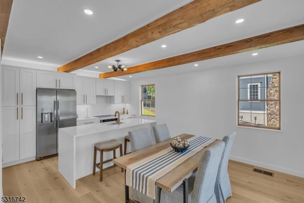 Dining room, Interior, Kitchen, Pendant Lights, Recessed Lighting, Stainless Steel Appliances, Wooden Beams, Wood Texture Flooring